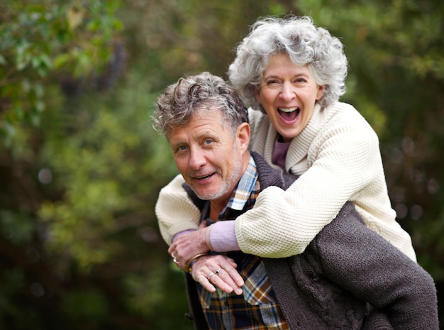 Golden moments together Shot of a loving senior couple being playful outside