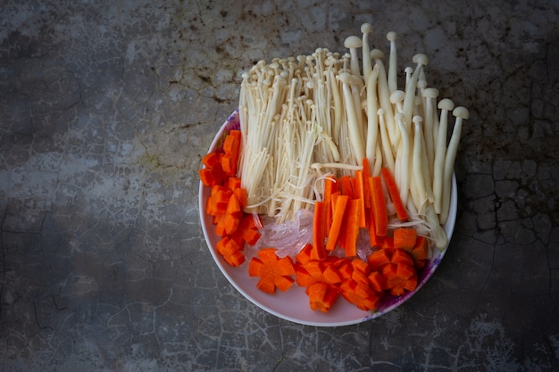 Golden Needle Mushroom in dish.