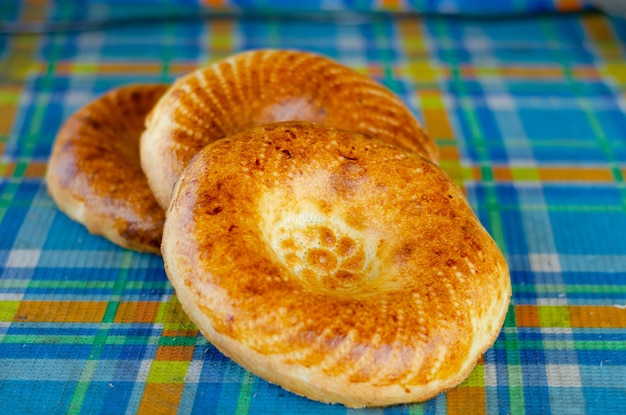 Golden round pita bread on the table.