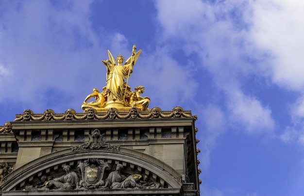 The golden sculpture on the top of Palais Garnier Paris September 2017