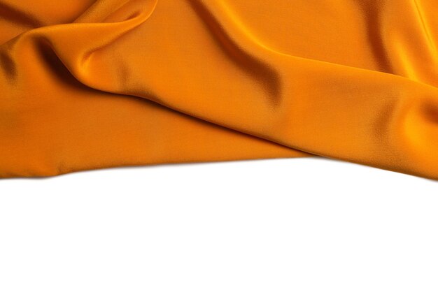 Golden silk or satin luxury fabric texture can use as abstract background. Top view.