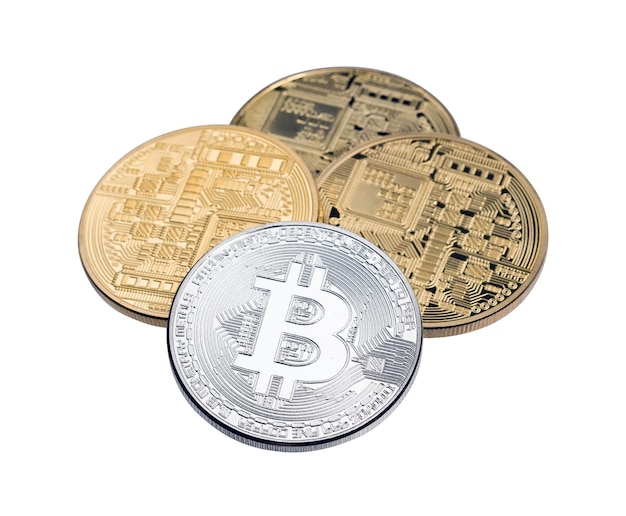 Golden and silver bitcoins on white background close up