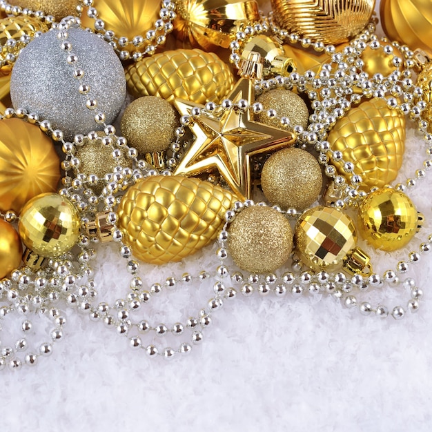 Golden and silver  Christmas decorations on a white background