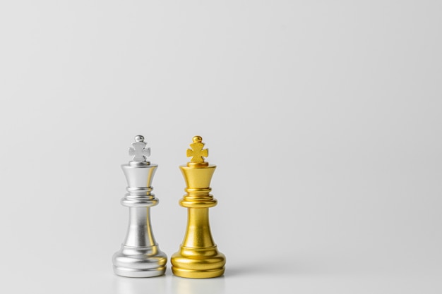 Golden and silver king chess standing encounter.