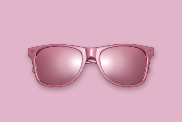 Golden sun glasses on a pink background Creative concept contemporary art