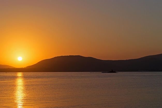 アルゲーロ海岸線の黄金の夕日