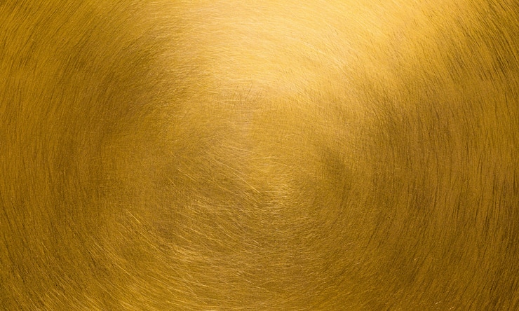 Photo golden texture background with scratches pointing on the center of the image