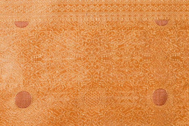 Photo golden toned abstract textile texture background