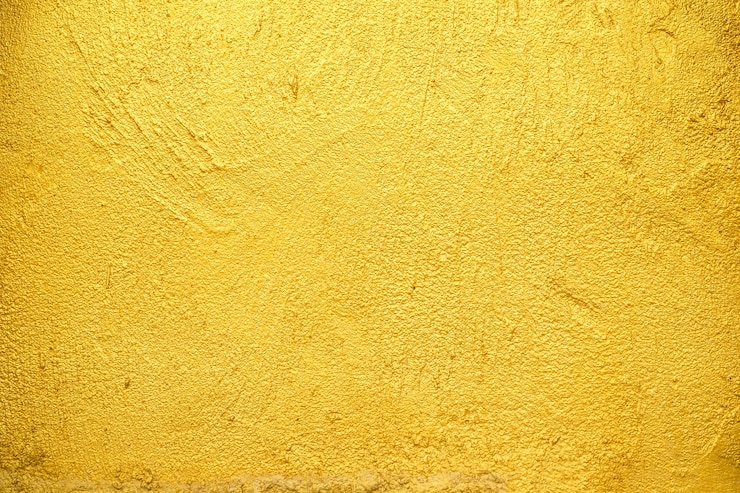 Photo golden wall texture background.