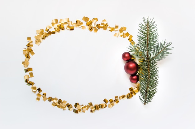 Golden wreath with ball and fir branch