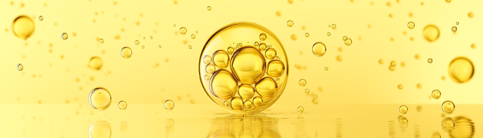 Premium Photo | Golden yellow bubbles oil or collagen serum for cosmetic product