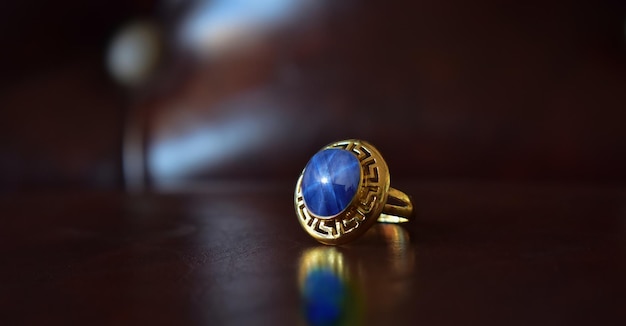 Goldring with blue sapphire