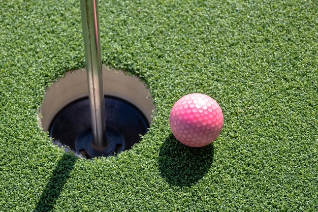 Golf ball on artificial grass