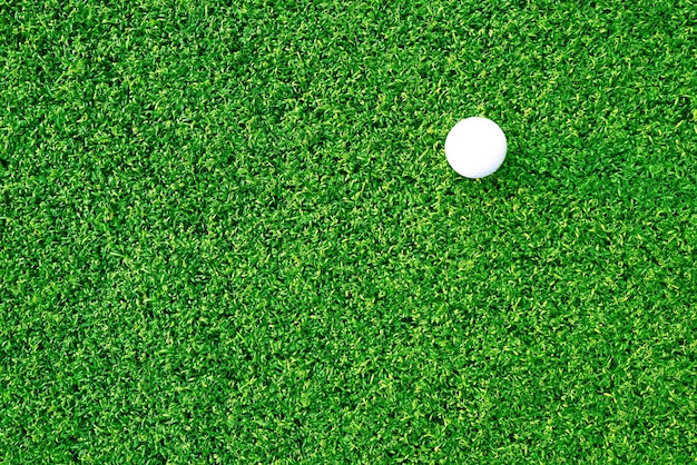 Golf ball close up on green grass on blurred beautiful landscape of golf backgroundConcept international sport that rely on precision skills for health relaxationx9