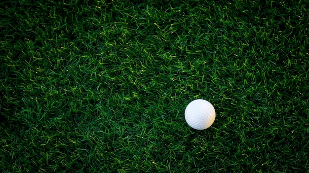 Golf ball close up on tee grass on blurred beautiful landscape of golf background Concept international sport that rely on precision skills for health relaxationx9