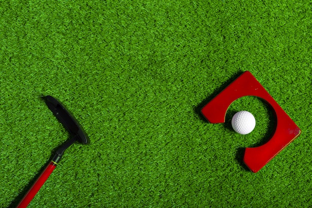 Golf ball and Golf Club on Grass