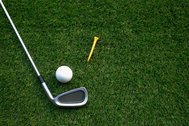 Golf equipment on green grass