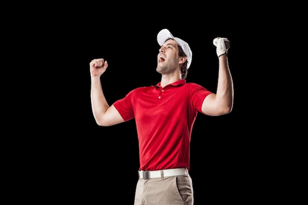 Golf Player in a red shirt celebrating, on a Black Background.