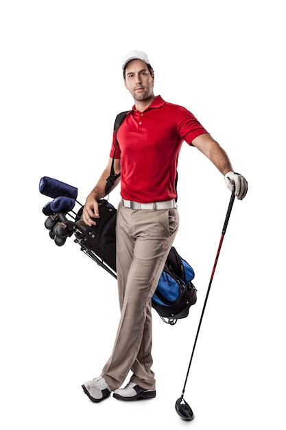 Golf Player in a red shirt, standing with a bag of golf clubs on his back, on a white space.