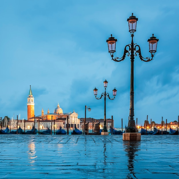 Gondolas floating in the Grand Canal on a cloudy day, Venice, Italy.