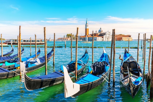 Gondolas moored in the lagoon of Venice not far from San Giorgio Maggiore Island Italy