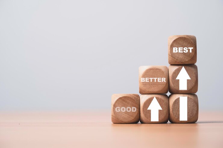 Good better and best on wooden block cube with up arrow for enhance and development product and service in the best condition concept