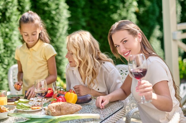 Good moments. A happy family sitting at the table and having a good time