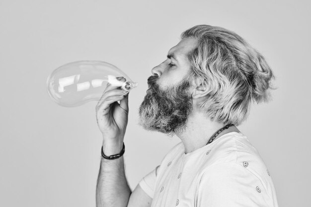 Good vibes Blow inflate bubbles Forever young guy Positive Carefree man soap bubbles Summer vacation Infantility concept Happy playful bearded hipster and soap bubbles Happiness and joy