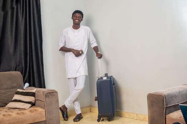 Goodlooking business man entering hotel room