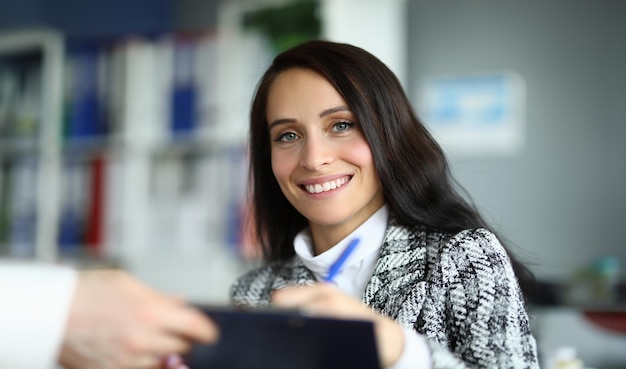 goodlooking employee in grey costume