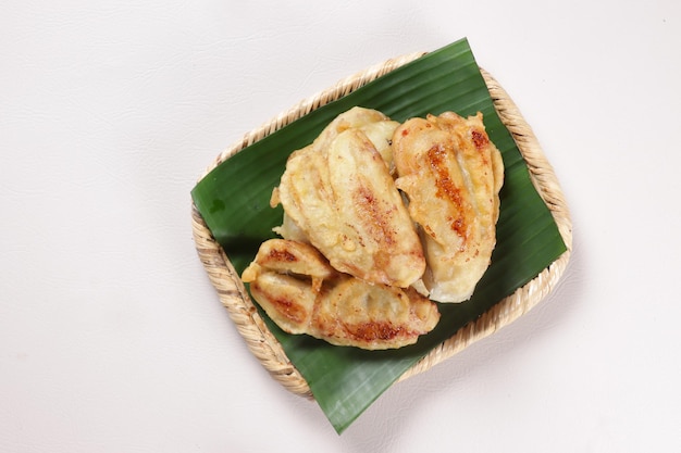 Gorengan or Pisang Goreng is Banana Fritter or Fried Banana Served in a Plate