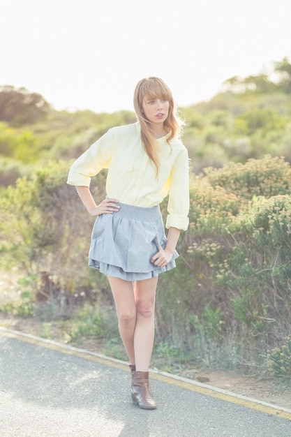 Gorgeous blonde woman on the roadside