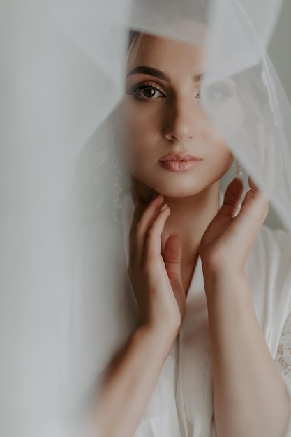 Gorgeous bride in a beautiful dress. Morning newlyweds.