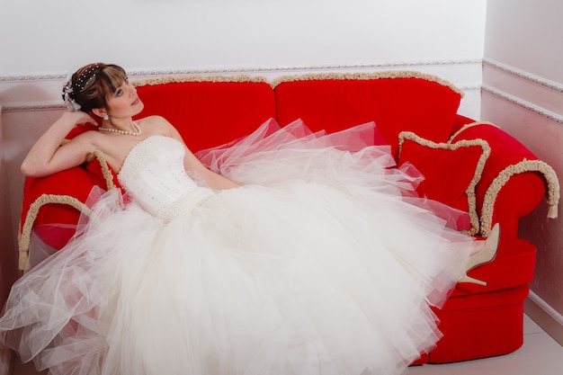 Gorgeous bride portrait with make-up in the morning in room.