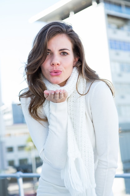 Gorgeous brunette blowing kiss 