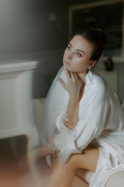 Gorgeous brunette bride in elegant dress