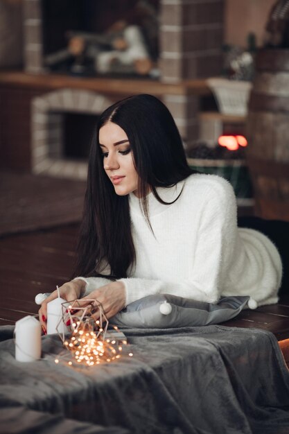 Gorgeous girl with long dark hair with little white dwarf