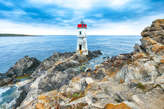 Gorgeous gloomy view of Capo Ferro Lighthouse