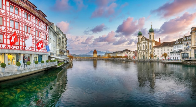 Gorgeous historic city center of Lucerne with famous buildings old wooden Chapel Bridge Kapellbrucke and Jesuitenkirche Church