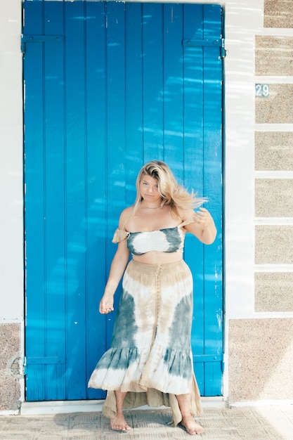 Gorgeous plus size young girl on white background Concept of body positivity