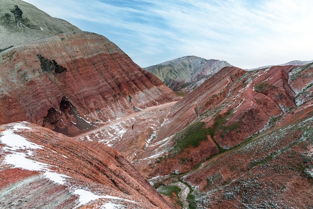 Gorgeous striped red mountains at winter