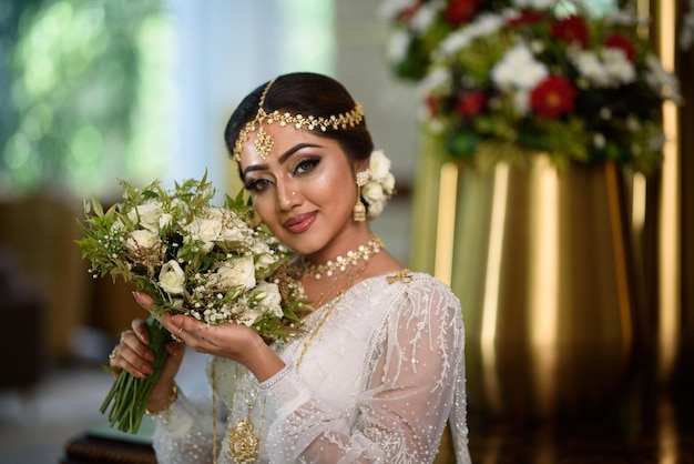 Gorgeous Traditional Sri Lankan Bride in traditional dress and jewelry