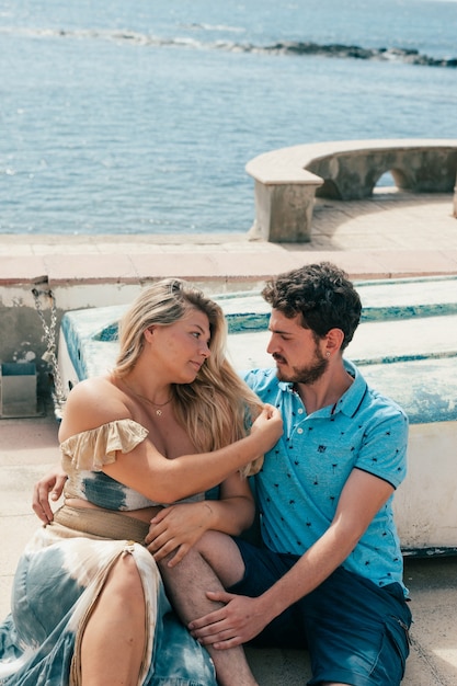 Gorgeous young couple in the sea travel