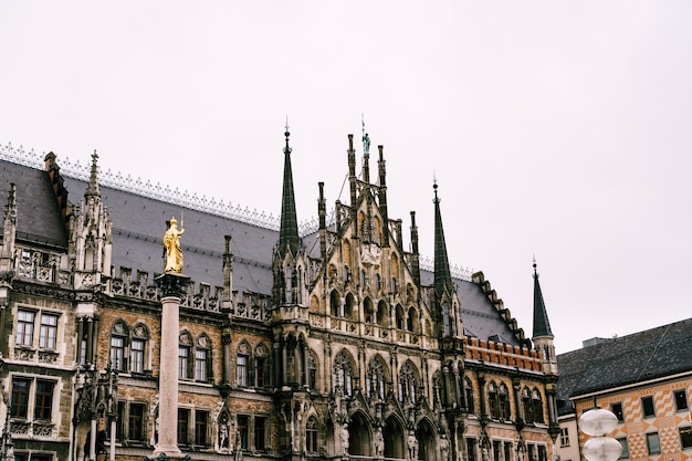 Gothic towers of the new town hall at marienplatz in munich