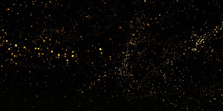 Foto goud glitter textuur op een zwarte achtergrond