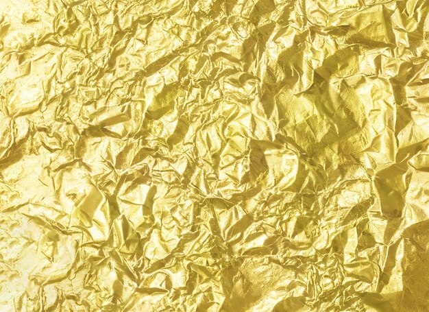 Foto gouden betonfolie papier textuur achtergrond