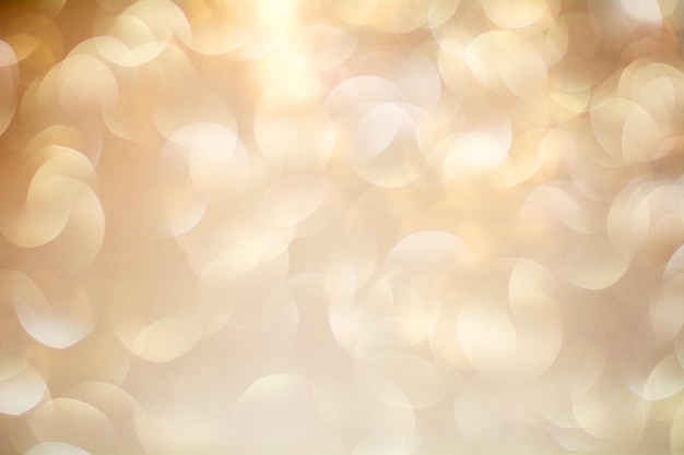 Gouden Bokeh Achtergrond De achtergrond met Boke Abstracte textuur Kleur cirkels Wazig