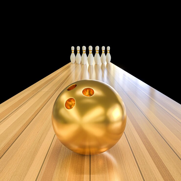 Gouden bowlingbal en skittles op de lijn