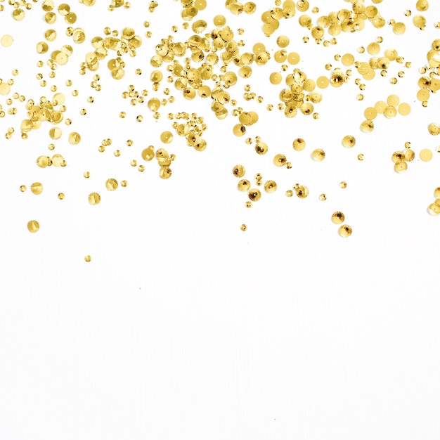 Foto gouden confettienklatergoud op wit