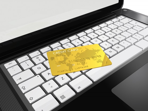 Gouden creditcard op laptop